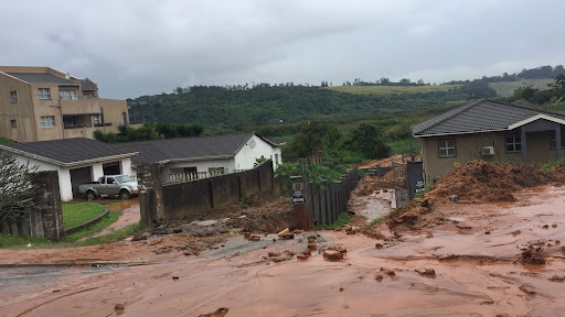 Two pregnant women were trapped in a house following a mudslide north of Durban on Wednesday.