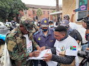 Members of Operation Dudula handed over a memorandum to SAPS at the Cape Town central police station on Saturday March 14 demanding action against illegal foreign nationals. 