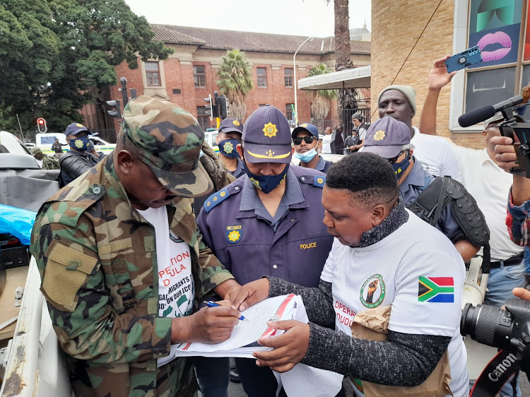 Members of Operation Dudula handed over a memorandum to SAPS at the Cape Town central police station on Saturday March 14 demanding action against illegal foreign nationals.