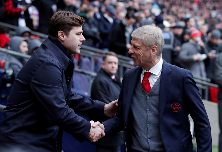 Tottenham manager Mauricio Pochettino with former Arsenal boss Arsene Wenger