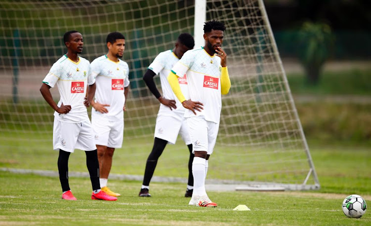 Keagan Dolly with Bafana Bafana captain Thulani Hlatshwayo and teammates Thabo Nodada and Innocent Maela during a training session in Durban on November 11 2020.