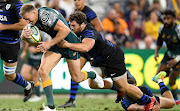 Reece Hodge of the Wallabies runs in to score a try during The Rugby Championship match between the Australian Wallabies and Argentina Pumas at QCB Stadium on September 25, 2021 in Townsville, Australia. 