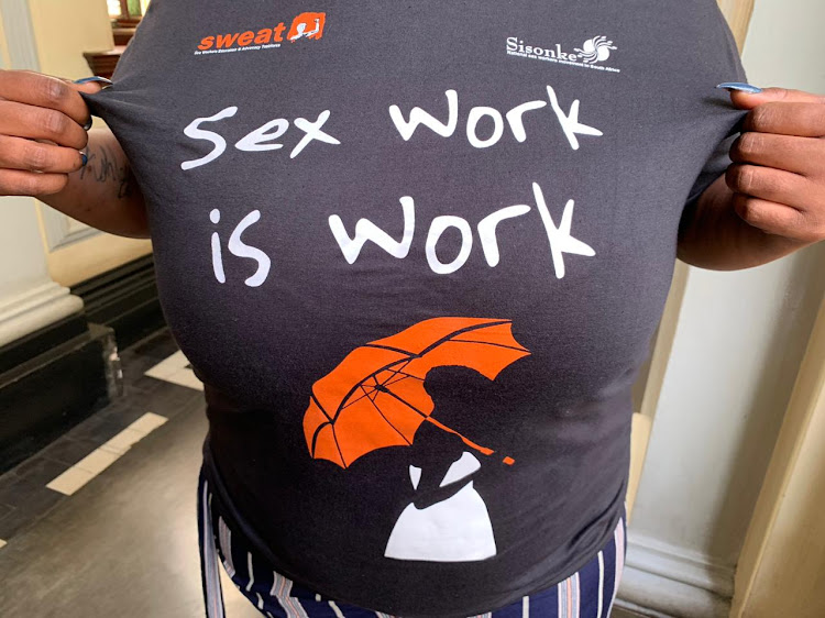 A member of the group SWEAT showcases her t- shirt in support of slain escort, Siam Lee. The man accused of Lee's murder appeared in the Durban High Court on Monday, March 11, 2019