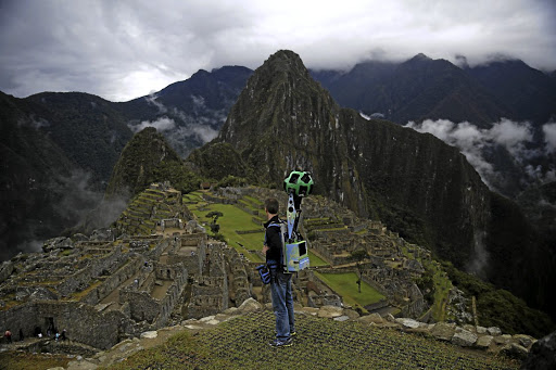 MAP MAKER: Daniel Filip, tech lead manager for Google Maps, carries a 15-camera device, while mapping Machu Picchu in the Andes Mountains in Peru for Google Street View.