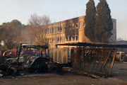 Two people died when they bombed an atm using a gas cylinder at the Tembisa Customer Care Centre in Rabasotho during service delivery protest. The Centre was burned and looted, with more than 10 cars burned.