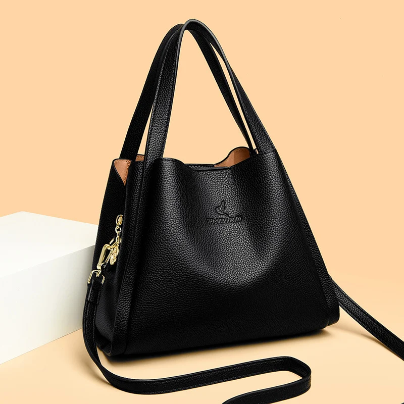 Bolsa de ombro feminina elegante, ideal para o dia a dia e trabalho. Couro vegetal, padrão e estilo casual.
