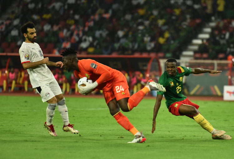 Cameroonian goalkeeper Andre Onana Onana (C) in action with Egypt's Mo Salah during a past Africa Cup of Nations match in Yaounde, Cameroon