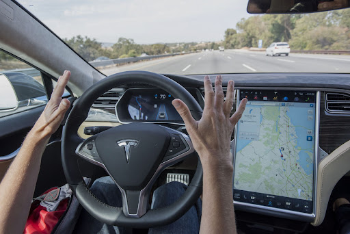 Tesla demonstrated a beta version of its driver-assistance system for California transportation officials, including outside consultants the automaker previously sought to bar from the event.