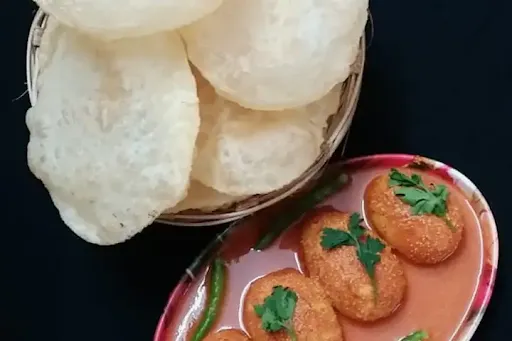 5 Luchi With Eggs Butter Masala (2pcs)