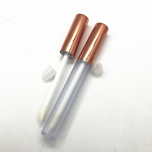 Title 6, Lip gloss tube for shiny, hydrated lips. Easy t...