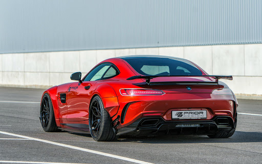 Sleek Red Sports Car Speeds Into the Sunset screenshot 2