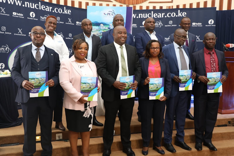 Energy Principal Secretary Alex Waxchira (third left) with DPP Renson Ingonga (right) and the management of Nuclear Power and Energy Agency (NuPEA) led by CEO Justus Wabuyabo and board chair Ezra Odhiambo during the launch of the strategic plan on March 18, 2024.