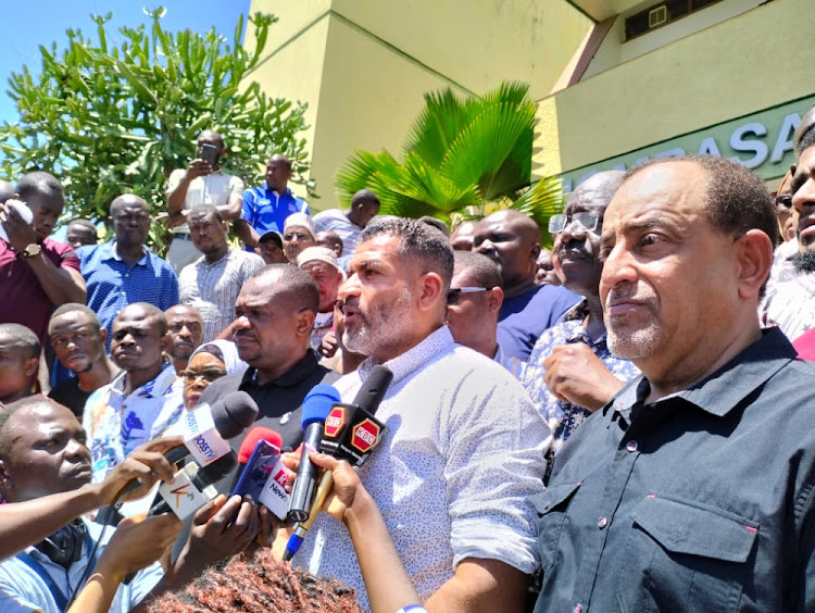 Jomvu MP Badi Twalib, Mombasa ODM gubernatorial candidate Abdulswamad Nassir and businessman Suleiman Shahbal outside the Mombasa law courts on Thursday.