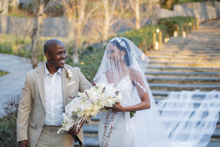 Bride-to-be Shoki (Shalate Sekhabi) walks down the aisle.