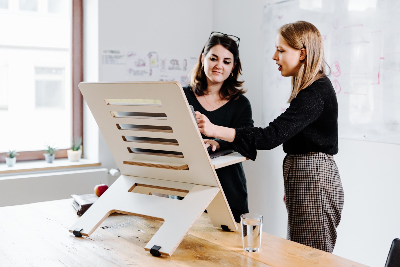 Two women working. 