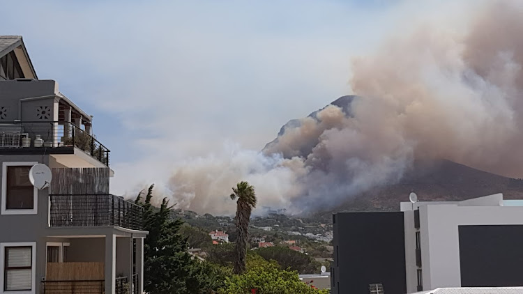 Smoke billows over Lion's Head on Sunday afternoon.