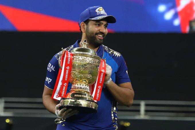 Rohit Sharma celebrates with the IPL trophy after leading the Mumbai Indians to glory.