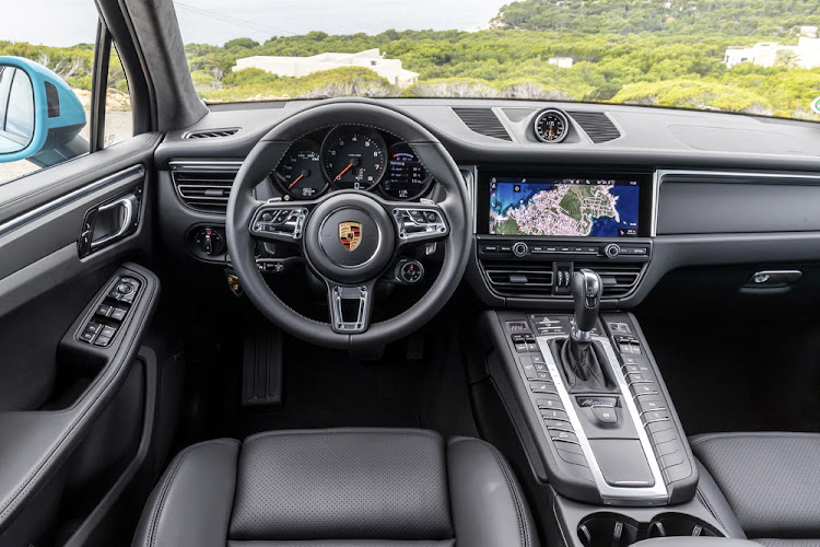 Both Macan models adopt much of the interior equipment and technology from big brother Cayenne, including a 10.9-inch touchscreen infotainment system. Picture: SUPPLIED