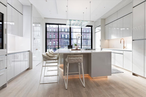 Buy this luxury house in Boston (United States) - Modern white kitchen with central island