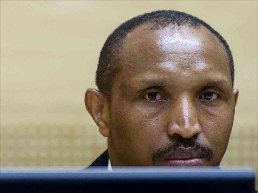 Congolese militia leader Bosco Ntaganda sits in the courtroom of the ICC (International Criminal Court) during the first day of his trial at the Hague in the Netherlands September 2, 2015. /REUTERS