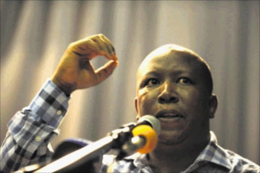 HOSPITALISED: ANC Youth League president Julius Malema speaks during the OR Tambo Memorial Lecture at the University of Limpopo's Turfloop campus on Tuesday night. PHOTO: ELIJAR MUSHIANA