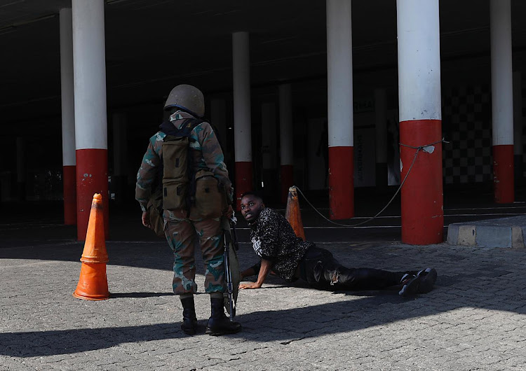 Members of the South African Defence Force patrolled in Yeoville Johannesburg central during a joint operation with the South African Police Services on day 31 of the national lockdown on April 26 2020.