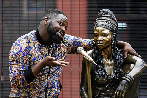 Bongani Fassie with a bronze image of his late mother, Brenda Fassie.