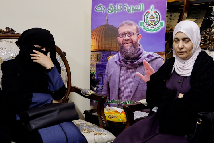 Palestinians gather at the house of Palestinian prisoner Khader Adnan, who died in an Israeli jail during a hunger strike, near Jenin in the Israeli-occupied West Bank May 2,2023.