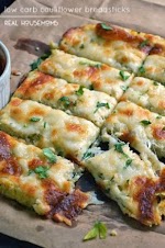 Low Carb Cauliflower Breadsticks was pinched from <a href="http://realhousemoms.com/low-carb-cauliflower-breadsticks/" target="_blank">realhousemoms.com.</a>