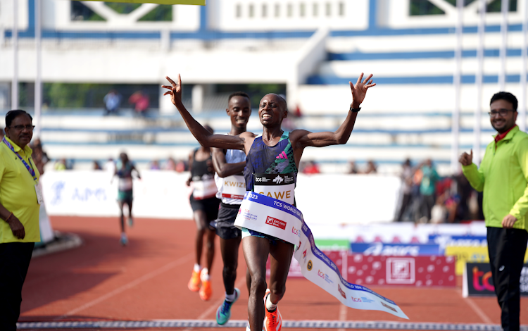 Men's Overall Winner Kenya's Sabastain Sawe at the finish line at the TCS World 10K 2023.JPG