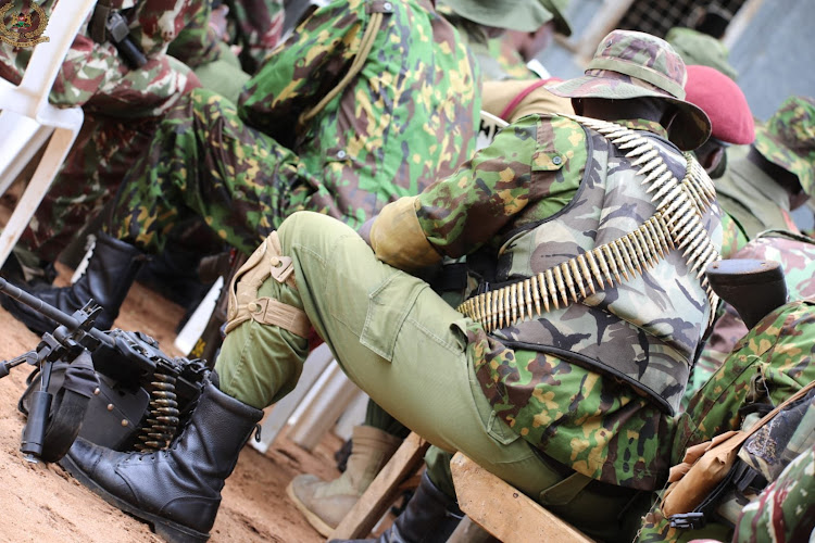 Armed security officers involved in the operation converge for a meeting at Tot, Baringo during the visit by Inspector General of Police Japhet Koome on April 3, 2024.