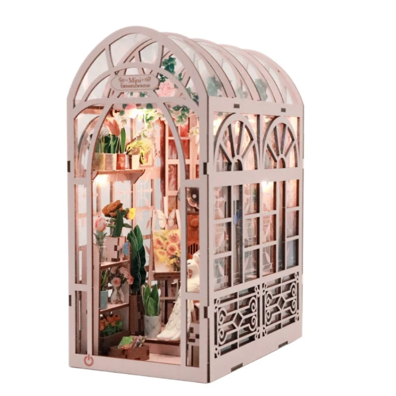 Hand-assembled DIY Cottage Mini Greenhouse Bookend Decoration. Enhance your shelves with a charming, handmade bookend fo