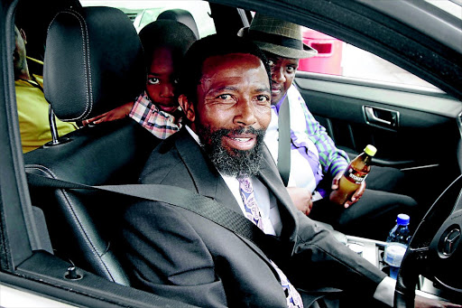 THE LAST RIDE? Thembu King Buyelekhaya Dalindyebo is seen in his luxury vehicle in Mthatha, Eastern Cape, yesterday after his bail extension hearing was postponed to today by the Mthatha High Court pHOTO: LULAMILE FENI