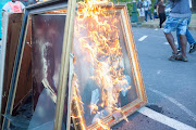 Students burnt paintings during a protest at the University of Cape Town this week.