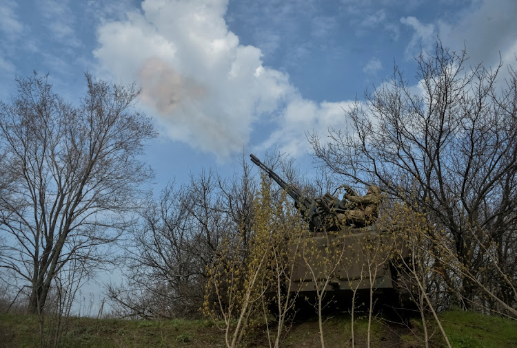 Ukrainian servicemen fire an anti-aircraft cannon as Russia's attack on Ukraine continues near the frontline city of Bakhmut, Ukraine, on April 7 2023.