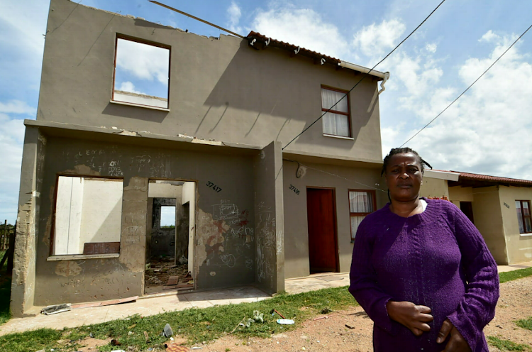 Motherwell NU29 resident Bonelwa Mbombela, 50, in front of her duplex.