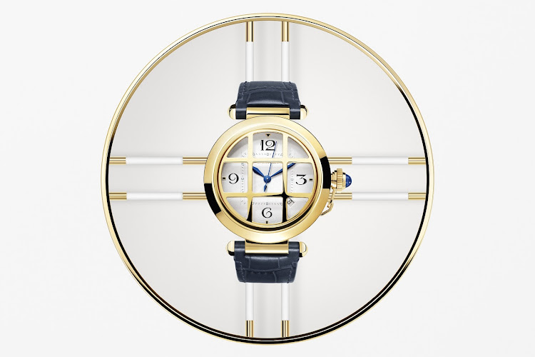 Pasha de Cartier Grille watch in yellow gold. The grille can be removed, allowing you to wear the timepiece with or without it, for two different looks.