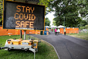 Signage at the entrance of one of the four celebration locations during New Year's Eve celebrations on December 31 2021 in Melbourne, Australia.