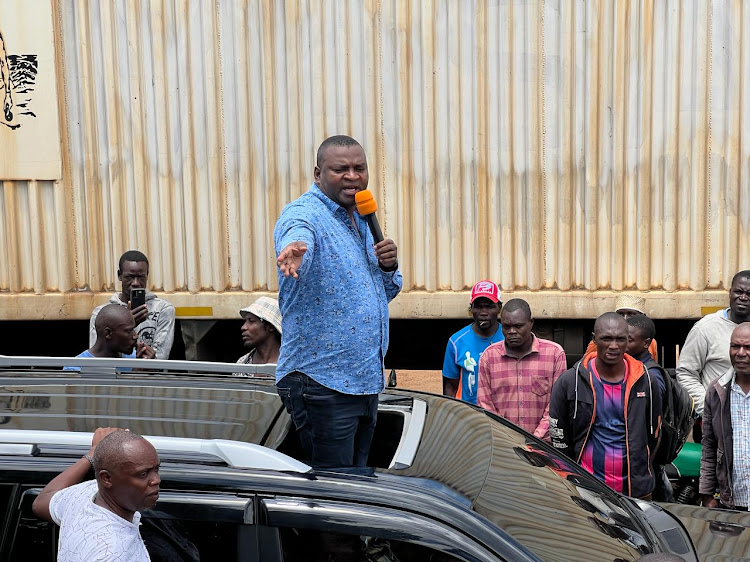 Former Sports Cabinet Secretary Rashid Echesa interacting with Mumias residents on Friday, April 12, 2024.