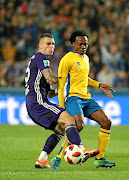 Ognjen Vranjes and Percy  Tau fight for the ball during the Croky Cup 1/16 final match between Rsc Anderlecht and Union Saint-Gilloise.