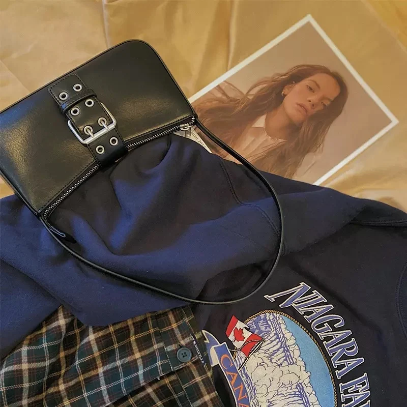 Retro cool leather buckle design shoulder bag, a stylish and functional accessory for everyday use. Carry your essential