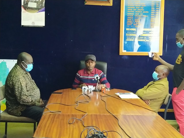 Rift Valley Regional Commissioner George Natembeya addressing the media at his office on Sunday, August 2 when he announced the arrest of 16 people in connection with the Mau conflicts.