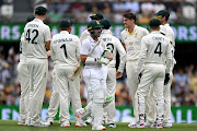 Proteas captain Dean Elgar of South Africa after losing his wicket to Pat Cummins of Australia on day two of the first Test against Australia at The Gabba in Brisbane on December 18 2022.