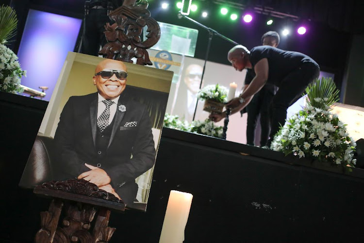 The final touches at Robbie Malinga's memorial.