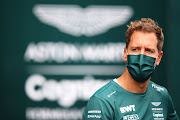 Sebastian Vettel looks on in the Paddock during previews ahead of the F1 Grand Prix of Great Britain at Silverstone on July 15, 2021 in Northampton, England.