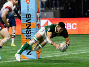 Impi Visser scores a try for the Blitzboks in their HSBC Vancouver Sevens match against Great Britain at BC Place in Vancouver, Canada on Friday.