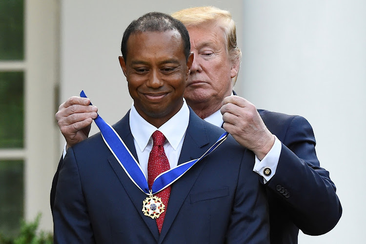 Golfer Tiger Woods is awarded the Presidential Medal of Freedom, the nation's highest civilian honor, by U.S. President Donald Trump in the Rose Garden at the White House in Washington, U.S., May 6, 2019.