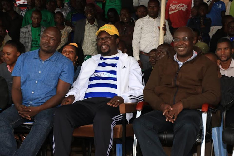 Kanduyi MP Wafula Wamunyinyi and Governor Wycliffe Wangamati during a football tournament at Masinde Muliro Stadium