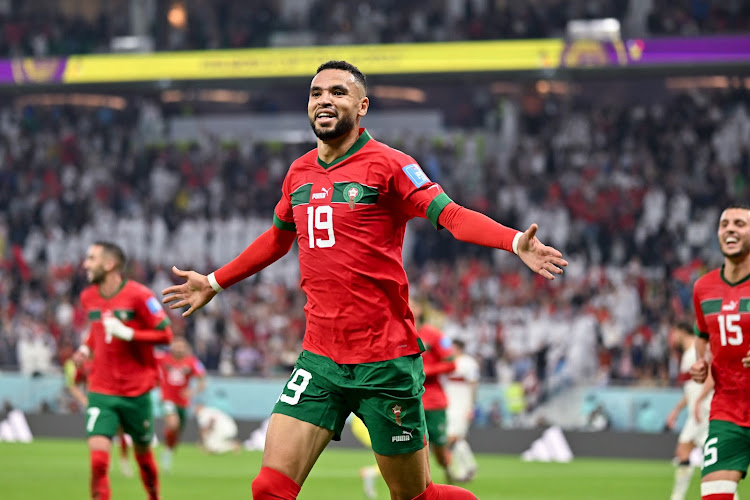 Youssef En-Nesyri of Morocco celebrates scoring during the Quarterfinal between Morocco and Portugal of the 2022 FIFA World Cup at Al Thumama Stadium in Doha, Qatar, Dec. 10, 2022.