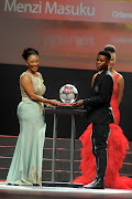 Menzi Masuku winner of the best goal of the season with him is Matshepo Majola during the PSL Player of the Year awards at Sandton Convention Centre on May 17, 2015 in Johannesburg, South Africa. (Photo by Lefty Shivambu/Gallo Images)